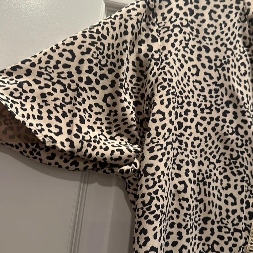 Beautiful Express 100% Rayon animal print top dry cleaned